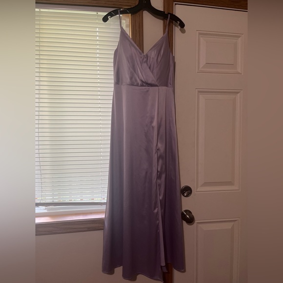 Bridesmaids dress wore once
It is altered to ankle length, size 2 - Picture 2 of 3